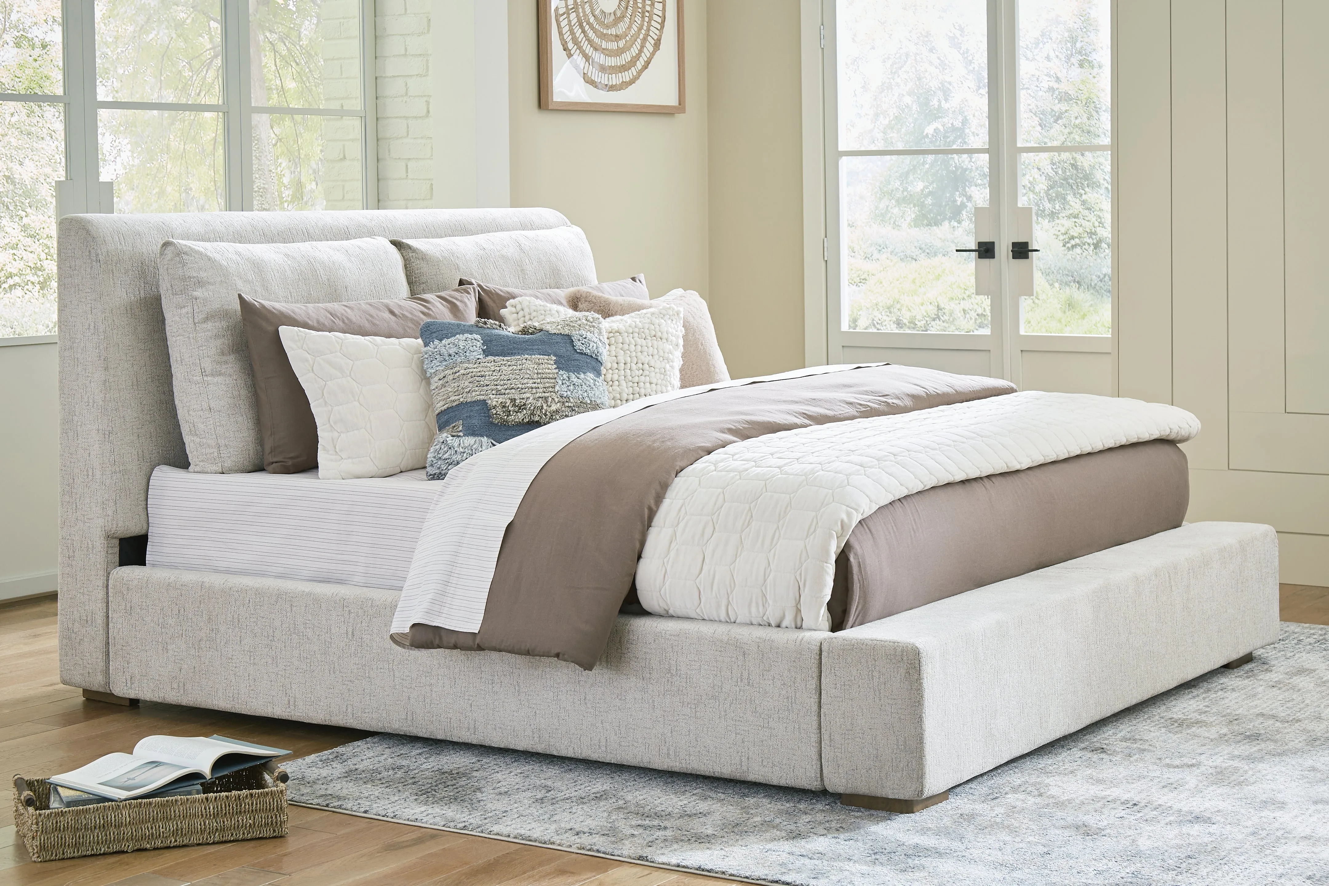 Cabalynn California King Upholstered Bed with Mirrored Dresser and Chest in Light Brown