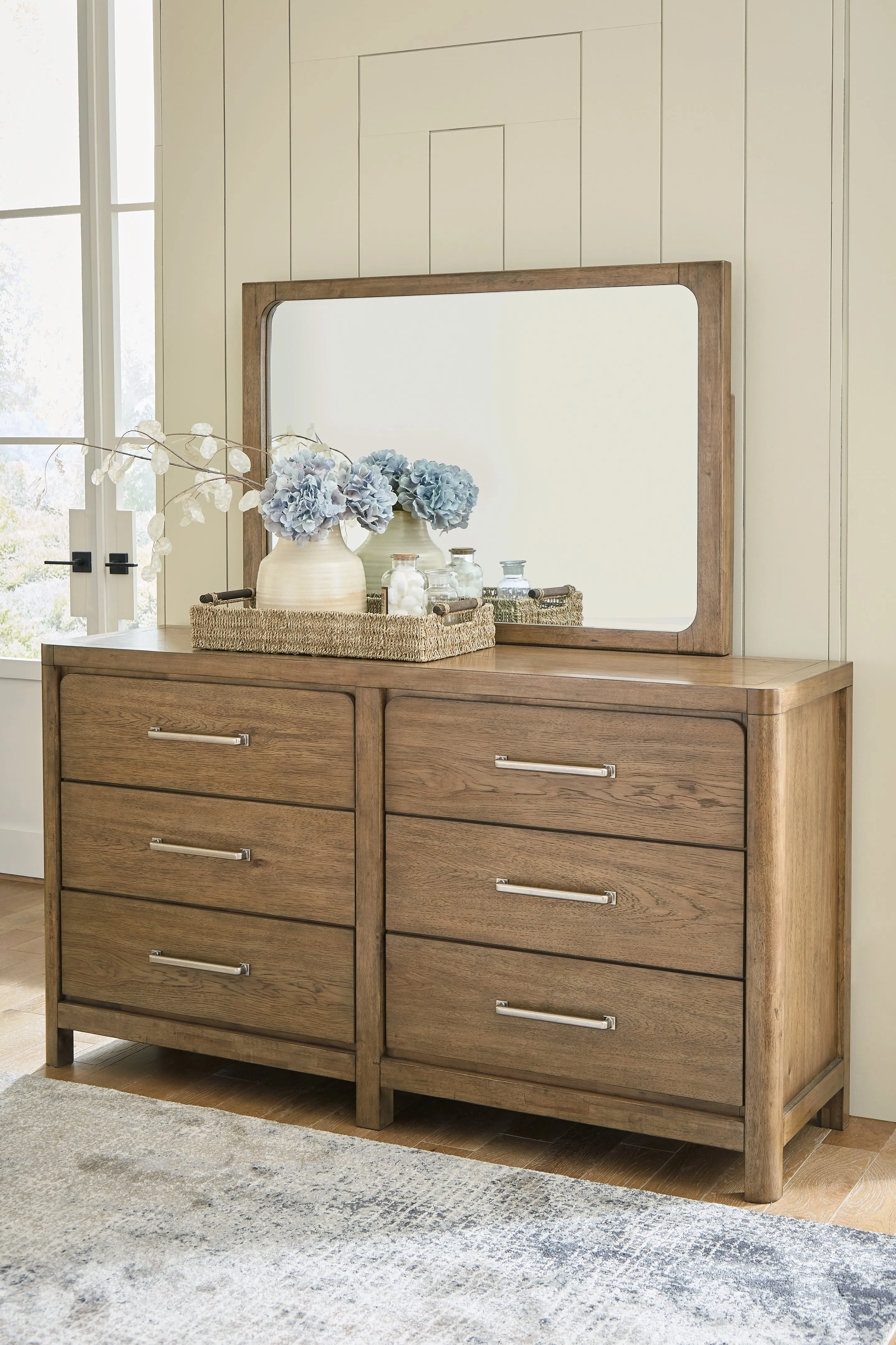 Cabalynn California King Upholstered Bed with Mirrored Dresser and Chest in Light Brown